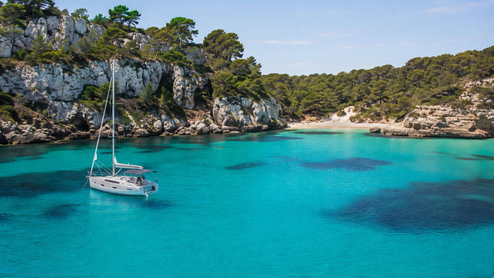 Menorca — A quieter island with natural harbours, clear anchorages and a coastline that rewards a more relaxed itinerary.